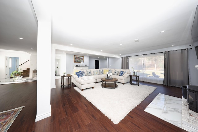 living room featuring dark hardwood / wood-style floors