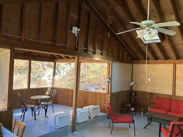 sunroom / solarium with ceiling fan and lofted ceiling