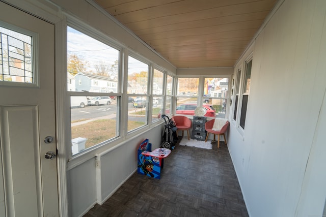 sunroom with wooden ceiling