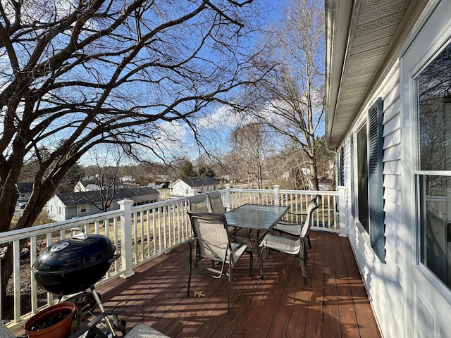 wooden terrace with area for grilling