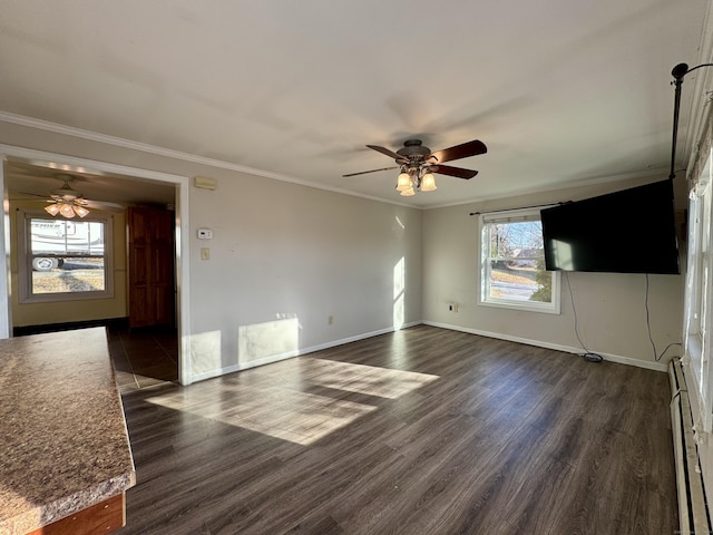 unfurnished living room with dark hardwood / wood-style flooring, baseboard heating, crown molding, and ceiling fan