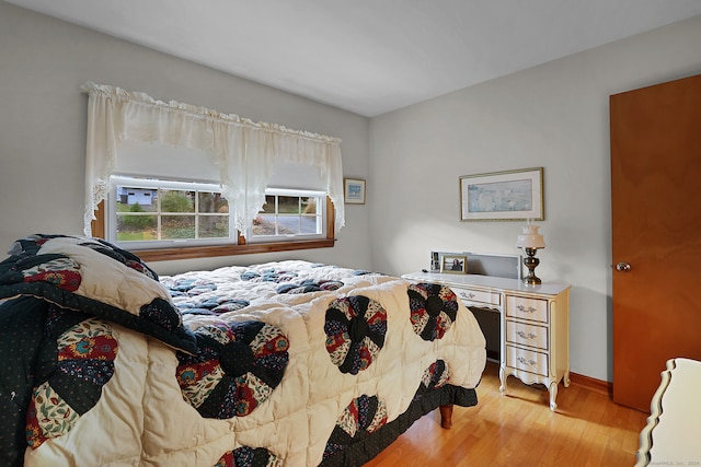 bedroom with light hardwood / wood-style floors