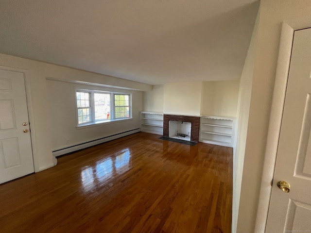 unfurnished living room featuring a fireplace, dark wood-type flooring, a baseboard radiator, and lofted ceiling