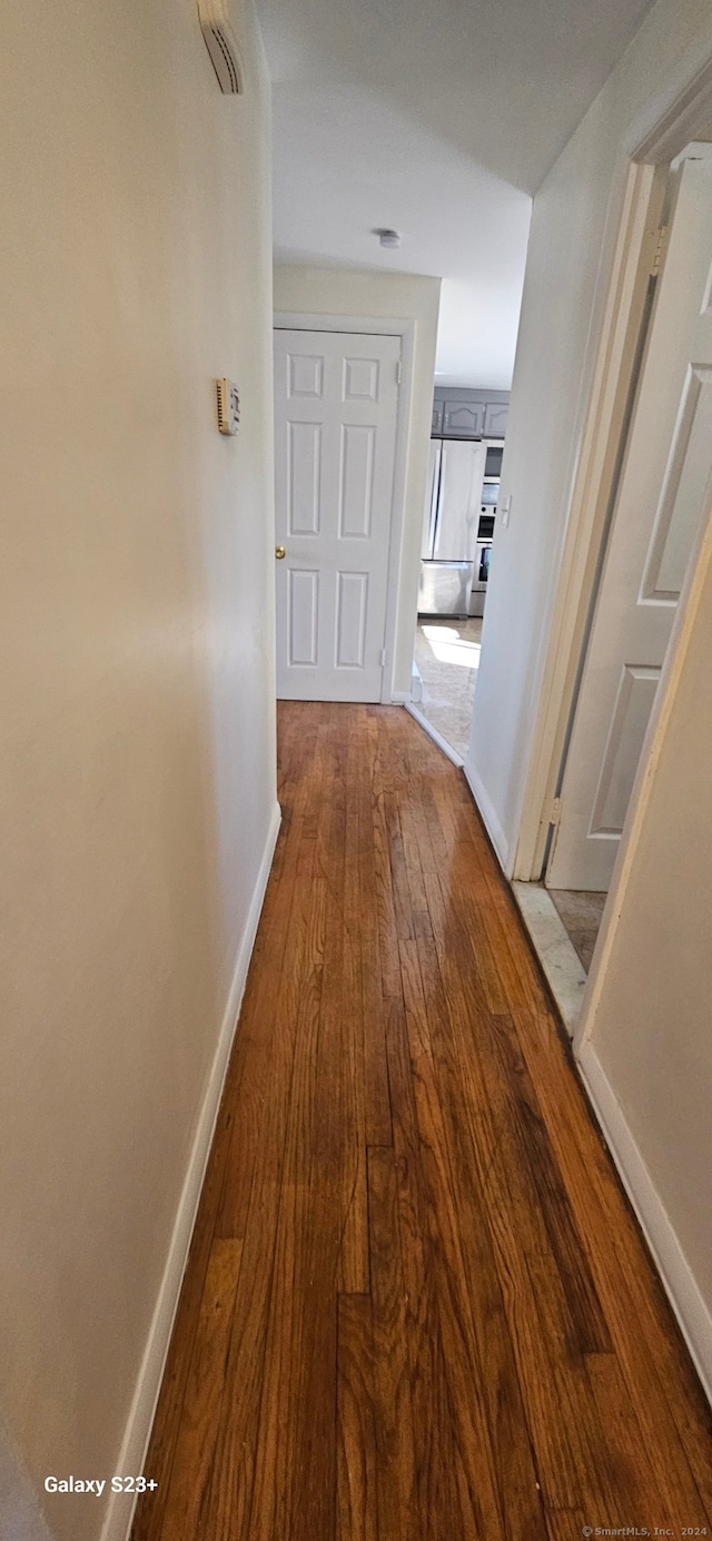 hall featuring hardwood / wood-style floors