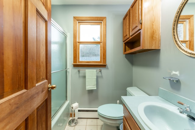 full bathroom with vanity, tile patterned floors, toilet, enclosed tub / shower combo, and a baseboard radiator