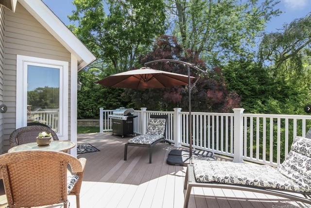 wooden terrace with grilling area