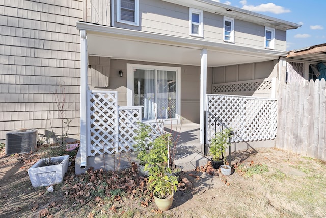 property entrance featuring central AC