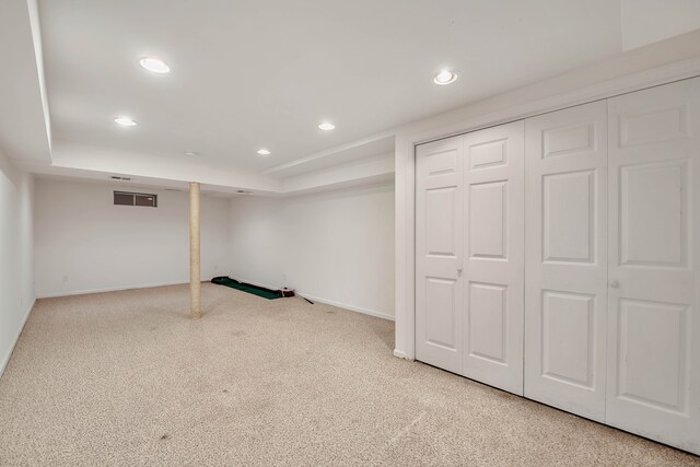 basement featuring carpet