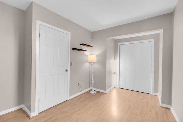 foyer entrance featuring light hardwood / wood-style floors