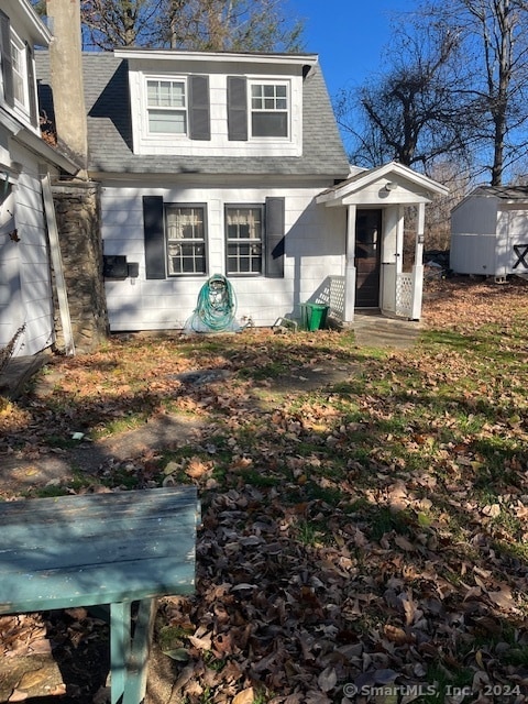 exterior space featuring a shed