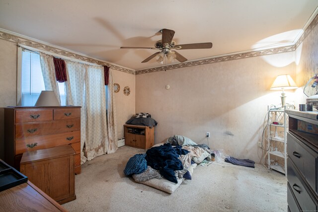 bedroom featuring ceiling fan, crown molding, and light colored carpet