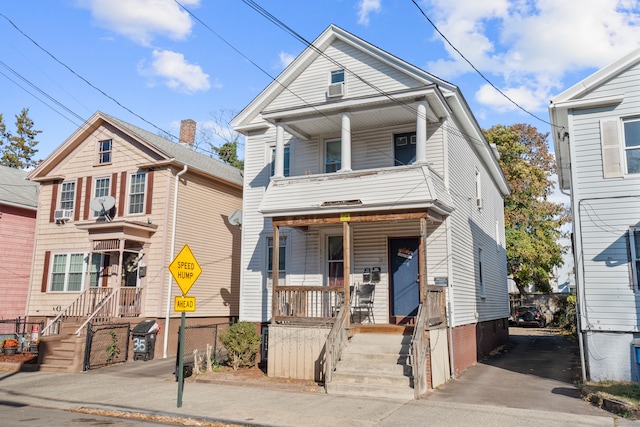 view of property featuring a porch