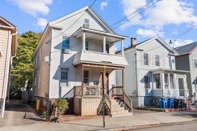 front of property with a balcony