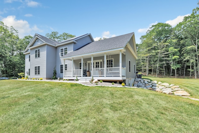 view of front facade with a porch and a front lawn