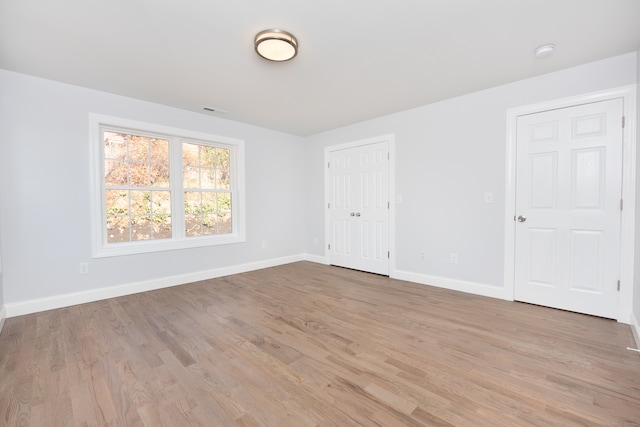 empty room featuring light hardwood / wood-style flooring