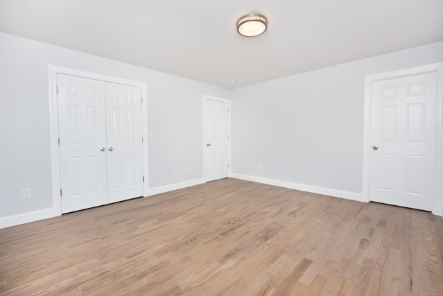 unfurnished bedroom featuring light hardwood / wood-style flooring