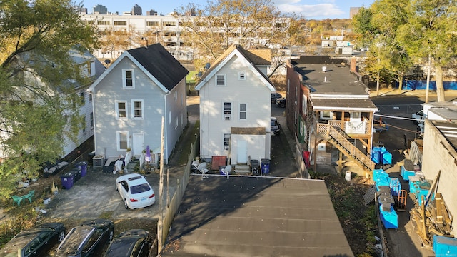 back of property featuring cooling unit