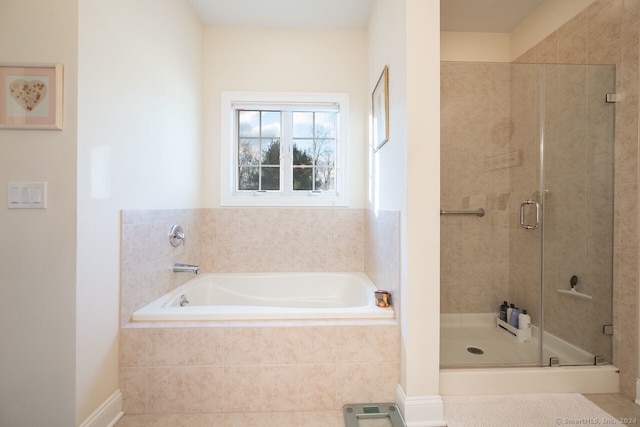 bathroom featuring plus walk in shower