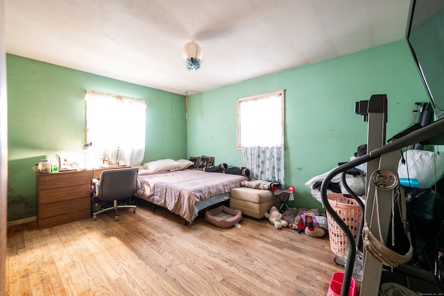 bedroom featuring light wood-type flooring