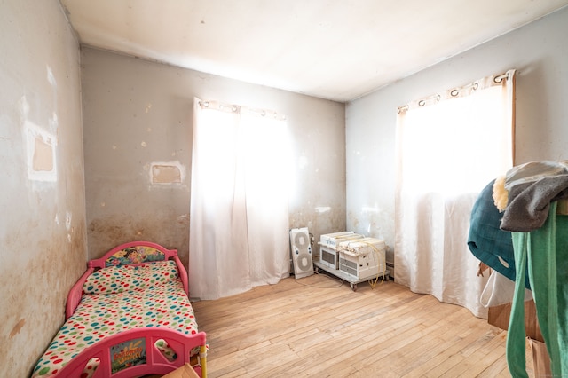 bedroom featuring light hardwood / wood-style floors