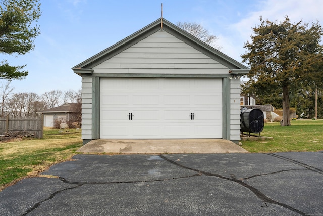 garage with a yard