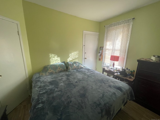 bedroom featuring wood-type flooring