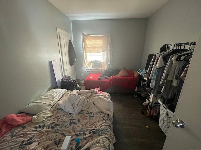 bedroom featuring dark hardwood / wood-style floors