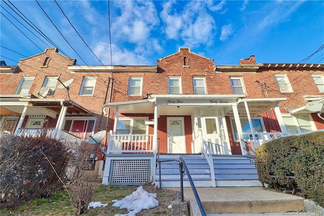 45 Ives St, Waterbury, CT 06704 - view of property featuring brick siding and covered porch
