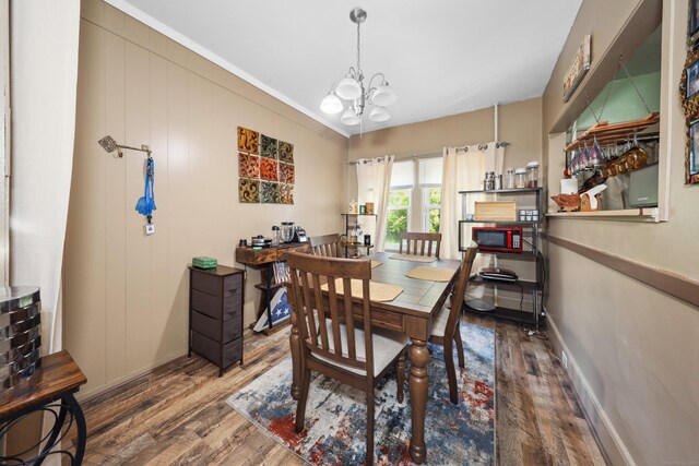 45 Ives St, Waterbury, CT 06704 - dining space with wood finished floors and a chandelier