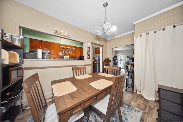 45 Ives St, Waterbury, CT 06704 - dining space featuring wood finished floors and a chandelier