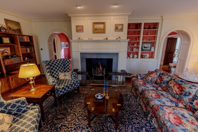 living room with hardwood / wood-style floors and ornamental molding