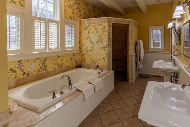 bathroom featuring beamed ceiling, tile patterned floors, independent shower and bath, and sink