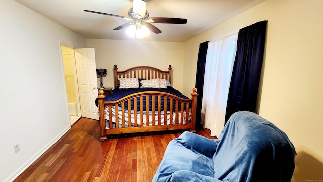 bedroom featuring hardwood / wood-style flooring and ceiling fan