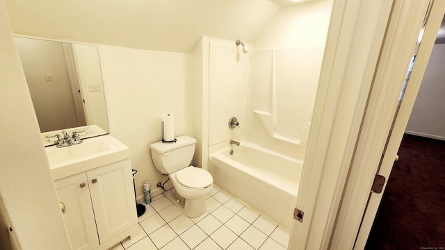 full bathroom with washtub / shower combination, tile patterned floors, lofted ceiling, toilet, and vanity