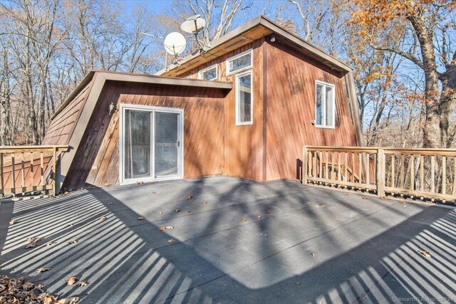 exterior space featuring a wooden deck