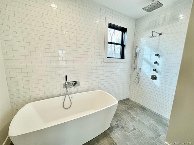 bathroom featuring separate shower and tub and tile walls