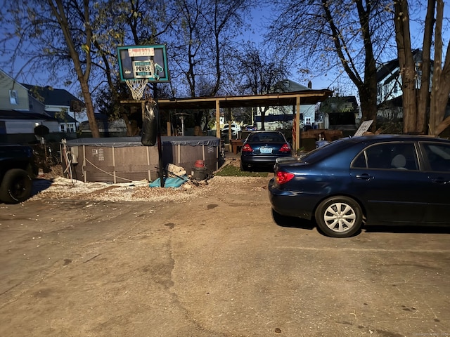 exterior space featuring a carport