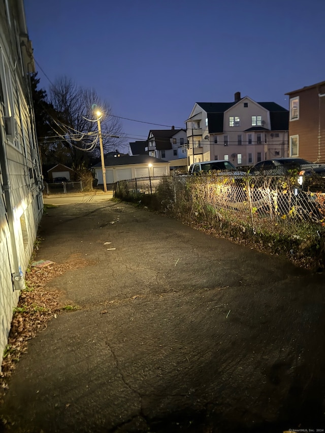 view of yard at dusk