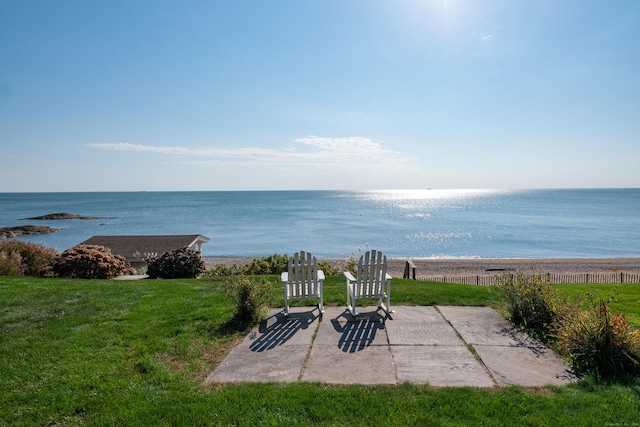 view of patio / terrace with a water view