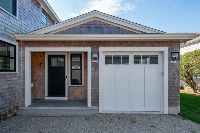 entrance to property featuring a garage