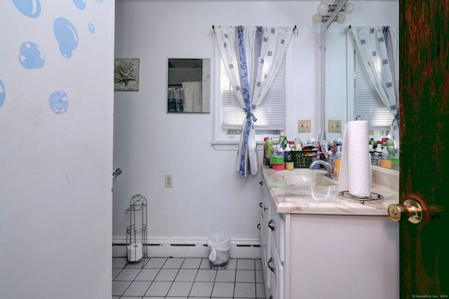 bathroom with tile patterned floors, vanity, and a baseboard radiator