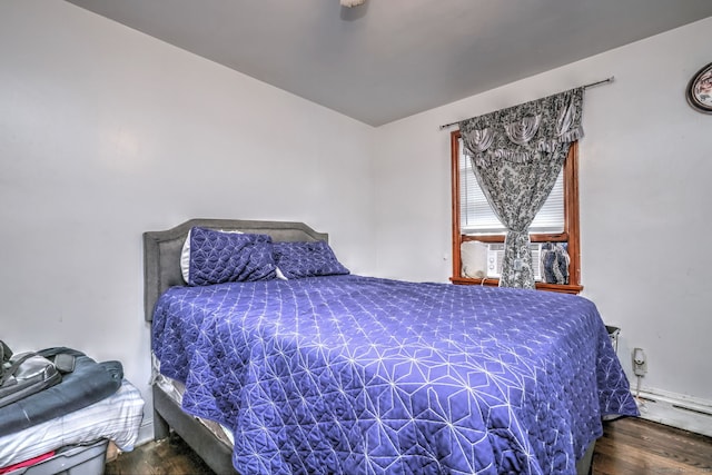 bedroom featuring hardwood / wood-style flooring and cooling unit