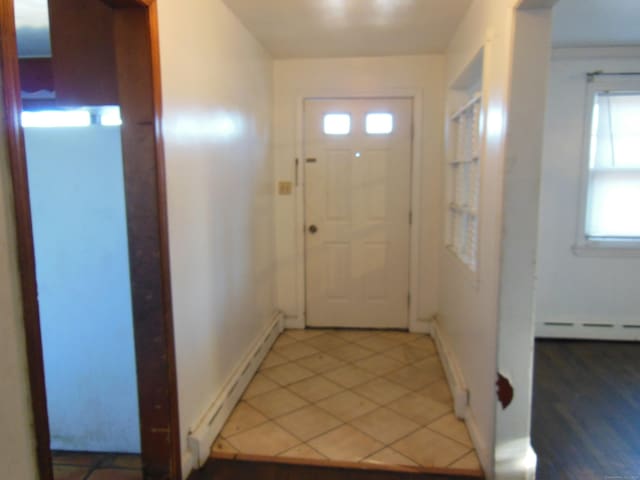 doorway with a baseboard radiator