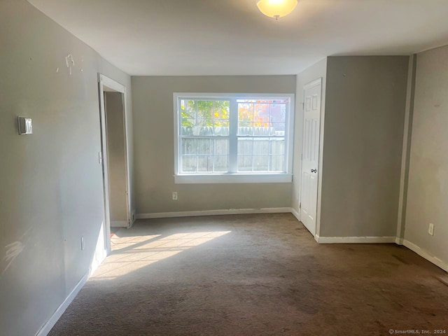 unfurnished bedroom featuring carpet