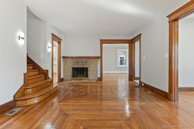 unfurnished living room featuring a fireplace