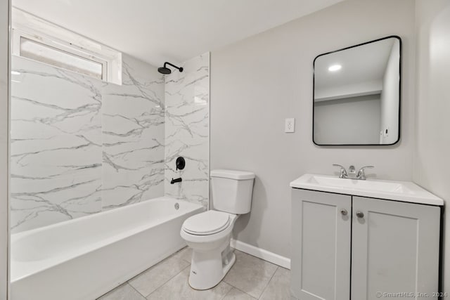 full bathroom featuring tile patterned flooring, toilet, vanity, and tiled shower / bath