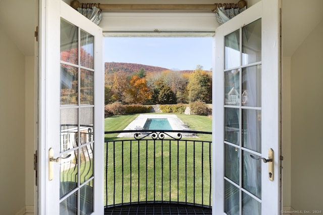 doorway to outside featuring a healthy amount of sunlight