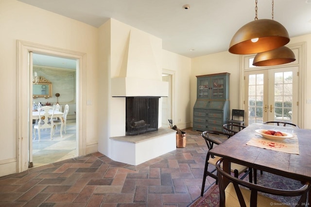 10 N Beaver Dam Rd, Salisbury, CT 06068 - dining room featuring a large fireplace and french doors