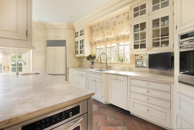 10 N Beaver Dam Rd, Salisbury, CT 06068 - kitchen featuring paneled built in fridge, stainless steel oven, light countertops, healthy amount of natural light, and crown molding