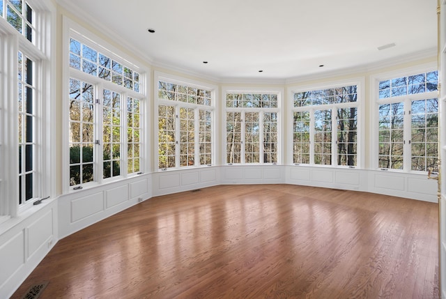 unfurnished sunroom with a healthy amount of sunlight